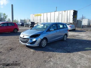 2012 Mazda Mazda5 Sport with VIN JM1CW2BL7C0105928, listed as a IAAI auction lot 42061224 with 59,993 mi miles. Bid and sale history available at carsss.com. Image 2.