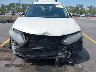 2016 Nissan Rogue S with VIN KNMAT2MT7GP604822, listed as a IAAI auction lot 41928614 with 95,596 mi miles and . Bid and sale history available at DreamBid. Image 6.