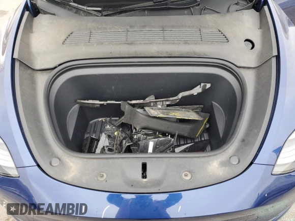 2023 Tesla Model Y Long Range with VIN 7SAYGAEE6PF689615, listed as a Copart auction lot 50999385 with 16,514 mi miles and Salvage Title. Bid and sale history available at DreamBid. Image 12.