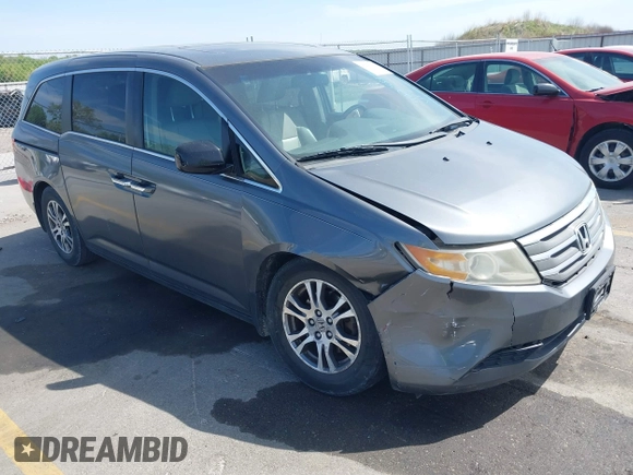2011 Honda Odyssey EX-L with VIN 5FNRL5H69BB092752, listed as a IAAI auction lot 42245534 with 142,718 mi miles and . Bid and sale history available at DreamBid. Image 1.