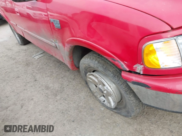 1998 Ford F-150 with VIN 1FTRX18L6WKB01340, listed as a IAAI auction lot 41566198 with 199,223 mi miles and . Bid and sale history available at DreamBid. Image 12.