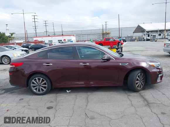 2019 Kia Optima LX z VIN 5XXGT4L37KG354649, wystawiony jako IAAI lot #42130410 z przebiegiem 61 315 mil mil oraz . Historia ofert i sprzedaży dostępna na DreamBid. Obrazek 12.