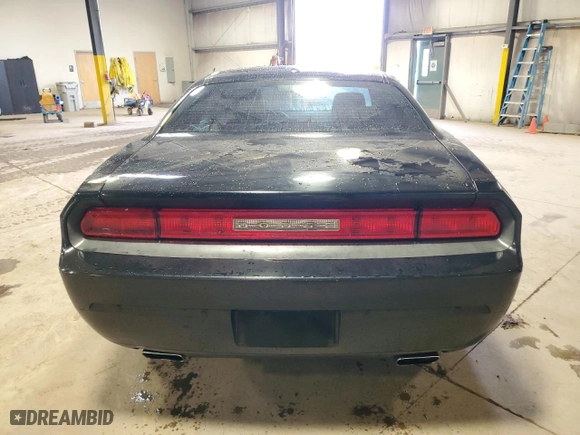 2013 Dodge Challenger SXT with VIN 2C3CDYAG5DH725000, listed as a Copart auction lot 82157004 with 188,278 mi miles and Salvage Title. Bid and sale history available at carsss.com. Image 6.
