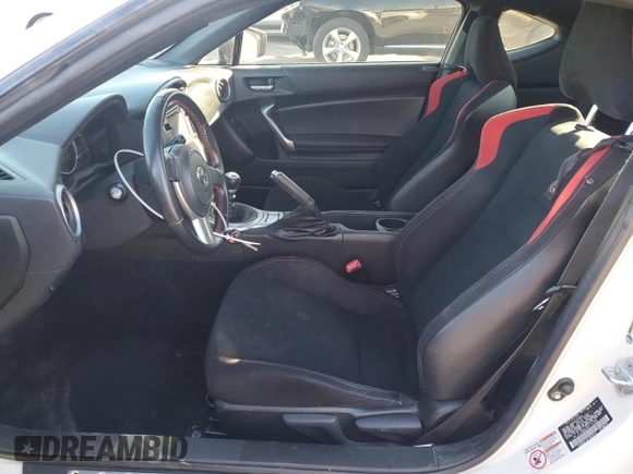 2013 Scion FR-S z VIN JF1ZNAA1XD1731496, wystawiony jako Copart lot #88248615 z przebiegiem 150 921 mil mil oraz Szkoda całkowita • Salvage title. Historia ofert i sprzedaży dostępna na DreamBid. Obrazek 7.