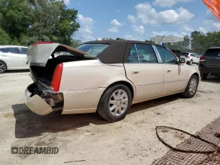 2011 Cadillac DTS Premium Collection z VIN 1G6KH5E62BU144403, wystawiony jako Copart lot #56494305 z przebiegiem 51 950 mil mil oraz Szkody całkowita. Historia ofert i sprzedaży dostępna na DreamBid. Obrazek 3.