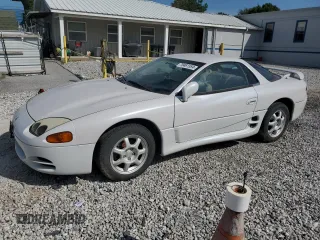 1996 Mitsubishi 3000GT GT z VIN JA3AM84J7TY005775, wystawiony jako Copart lot #70461554 z przebiegiem 102 704 mil mil oraz Tytuł czysty. Historia ofert i sprzedaży dostępna na DreamBid. Obrazek 1.