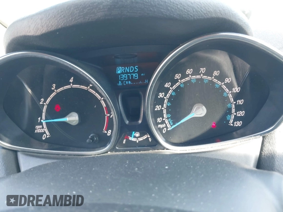 2015 Ford Fiesta SE z VIN 3FADP4BJ7FM158471, wystawiony jako IAAI lot #42090819 z przebiegiem 139 779 mil mil oraz . Historia ofert i sprzedaży dostępna na DreamBid. Obrazek 7.