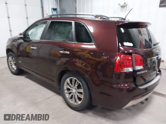 2013 Kia Sorento SX with VIN 5XYKWDA2XDG381984, listed as a IAAI auction lot 41169315 with 144,010 mi miles. Bid and sale history available at carsss.com. Image 3.