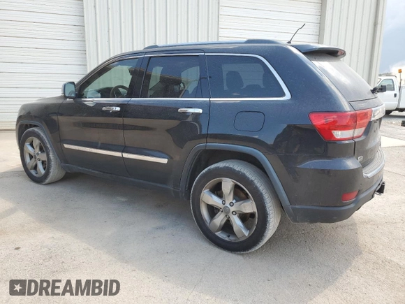 2013 Jeep Grand Cherokee Overland with VIN 1C4RJECT7DC526119, listed as a Copart auction lot 60735594 with 143,454 mi miles and Clean Title. Bid and sale history available at carsss.com. Image 2.