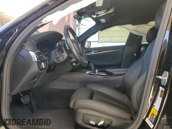 2020 BMW 5 Series 530e with VIN WBAJA9C01LCD69759, listed as a Copart auction lot 58271025 with 56,732 mi miles and Salvage title. Bid and sale history available at DreamBid. Image 7.