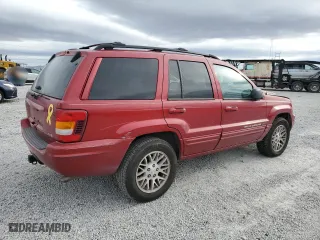 2004 Jeep Grand Cherokee Limited with VIN 1J8GW58N84C257060, listed as a Copart auction lot 43239715 with 113,541 mi miles and Salvage Title. Bid and sale history available at carsss.com. Image 3.