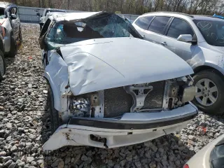 2000 GMC Jimmy SLS Base with VIN 1GKCS18W8YK276338, listed as a Copart auction lot 77056283 with 495,127 mi miles and Salvage Title. Bid and sale history available at carsss.com. Image 5.