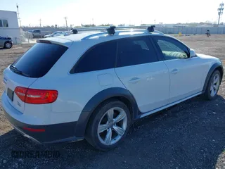 2015 Audi allroad Premium with VIN WA1TFAFL7FA117297, listed as a IAAI auction lot 41384957 with 111,653 mi miles. Bid and sale history available at carsss.com. Image 4.