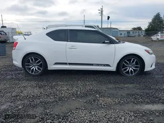 2013 Scion tC with VIN JTKJF5C70D3065601, listed as a IAAI auction lot 41272881 with 110,828 mi miles. Bid and sale history available at carsss.com. Image 13.