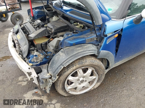 2006 MINI Hardtop with VIN WMWRC33516TK18735, listed as a IAAI auction lot 42519124 with 135,976 mi miles and . Bid and sale history available at DreamBid. Image 6.