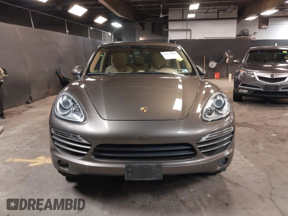 2014 Porsche Cayenne with VIN WP1AA2A26ELA93026, listed as a IAAI auction lot 42272409 with 58,951 mi miles and . Bid and sale history available at DreamBid. Image 12.