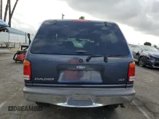 1998 Ford Explorer XL z VIN 1FMZU34EXWZA13244, wystawiony jako Copart lot #54456095 z przebiegiem 192 527 mil mil oraz Szkoda całkowita • Salvage title. Historia ofert i sprzedaży dostępna na DreamBid. Obrazek 6.
