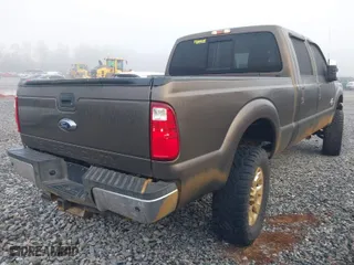 2015 Ford Super Duty F-250 SRW Lariat with VIN 1FT7W2BT5FEB19206, listed as a IAAI auction lot 41472129 with 185,542 mi miles. Bid and sale history available at carsss.com. Image 4.