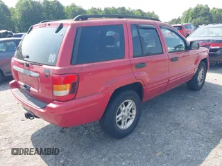 2004 Jeep Grand Cherokee Laredo with VIN 1J4GW48S24C357110, listed as a IAAI auction lot 42395691 with 160,132 mi miles and . Bid and sale history available at DreamBid. Image 4.
