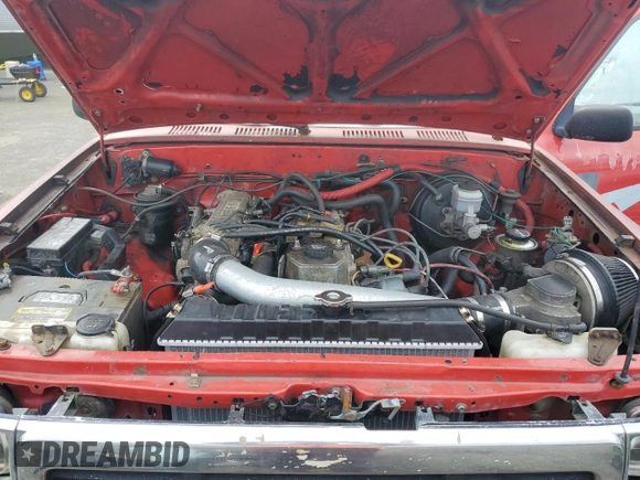 1990 Toyota Pickup с VIN JT4RN13P3L6015603, выставлен на аукционе Copart как лот 50994505 с пробегом 198 836 миль миль и Чистый • Clean title. История ставок и продаж доступна на DreamBid. Изображение 11.