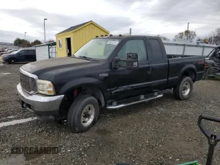 2003 Ford Super Duty F-250 XL with VIN 1FTNX21L13EB63351, listed as a Copart auction lot 85092674 with 265,515 mi miles and Salvage Title. Bid and sale history available at carsss.com. Image 1.