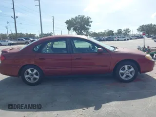 2002 Ford Taurus SES Standard with VIN 1FAFP55S42A135871, listed as a IAAI auction lot 40822596 with 185,605 mi miles. Bid and sale history available at carsss.com. Image 13.
