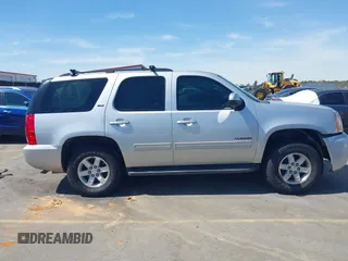 2014 GMC Yukon SLT with VIN 1GKS1CE04ER121301, listed as a IAAI auction lot 41825056 with 141,562 mi miles. Bid and sale history available at carsss.com. Image 14.