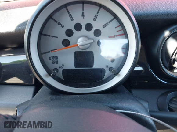 2009 MINI Hardtop S with VIN WMWMF73589TT95974, listed as a IAAI auction lot 41617775 with Not provided miles and . Bid and sale history available at DreamBid. Image 7.