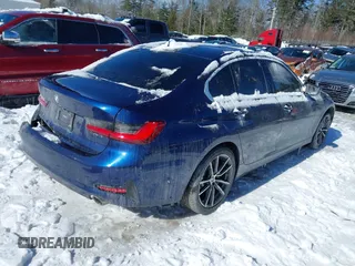 2019 BMW 3 Series 330i xDrive with VIN WBA5R7C59KAJ82495, listed as a IAAI auction lot 41597332 with 79,192 mi miles. Bid and sale history available at carsss.com. Image 4.