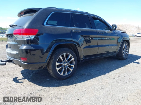 2017 Jeep Grand Cherokee Overland with VIN 1C4RJFCG0HC844713, listed as a IAAI auction lot 42293301 with 83,791 mi miles and . Bid and sale history available at DreamBid. Image 4.