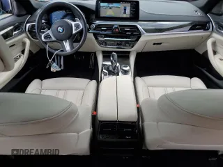 2023 BMW 5 Series M550i xDrive with VIN WBA13BK06PCM31937, listed as a Copart auction lot 66490494 with 24,972 mi miles and Salvage title. Bid and sale history available at DreamBid. Image 8.