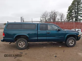 1998 Dodge Dakota SLT with VIN 1B7GG22Y9WS723805, listed as a IAAI auction lot 41289779 with 234,324 mi miles. Bid and sale history available at carsss.com. Image 13.