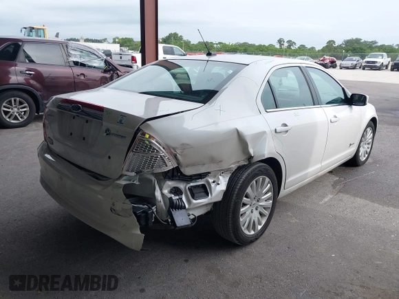 2010 Ford Fusion Hybrid with VIN 3FADP0L35AR182062, listed as a IAAI auction lot 42399945 with 101,565 mi miles and . Bid and sale history available at DreamBid. Image 4.