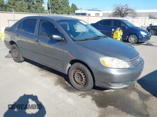 2003 Toyota Corolla CE with VIN 1NXBR32E43Z059733, listed as a IAAI auction lot 41431469 with 299,999 mi miles and . Bid and sale history available at DreamBid. Image 1.