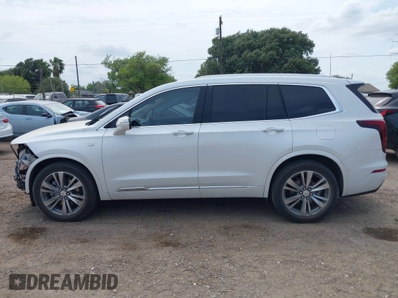 2022 Cadillac XT6 Premium Luxury with VIN 1GYKPCRS2NZ161800, listed as a IAAI auction lot 42174382 with 45,746 mi miles and . Bid and sale history available at DreamBid. Image 14.