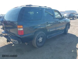 2003 Chevrolet Tahoe LT with VIN 1GNEC13Z33R166971, listed as a IAAI auction lot 41356669 with 318,527 mi miles. Bid and sale history available at carsss.com. Image 4.