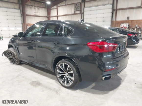 2019 BMW X6 xDrive35i with VIN 5UXKU2C51K0Z64897, listed as a IAAI auction lot 41759156 with 64,434 mi miles. Bid and sale history available at carsss.com. Image 3.