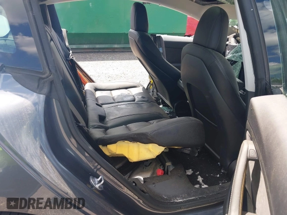 2022 Tesla Model 3 Long Range z VIN 5YJ3E1EB0NF124664, wystawiony jako IAAI lot #34246337 z przebiegiem Nie podano mil oraz . Historia ofert i sprzedaży dostępna na DreamBid. Obrazek 8.