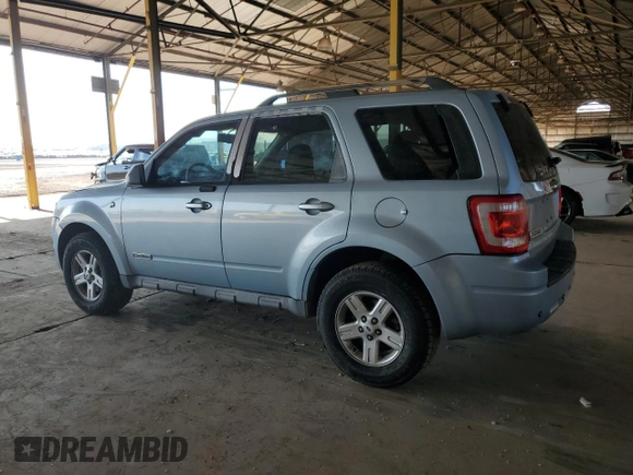 2008 Ford Escape Hybrid with VIN 1FMCU49H98KA28845, listed as a Copart auction lot 52648135 with 210,756 mi miles and Salvage title. Bid and sale history available at DreamBid. Image 2.