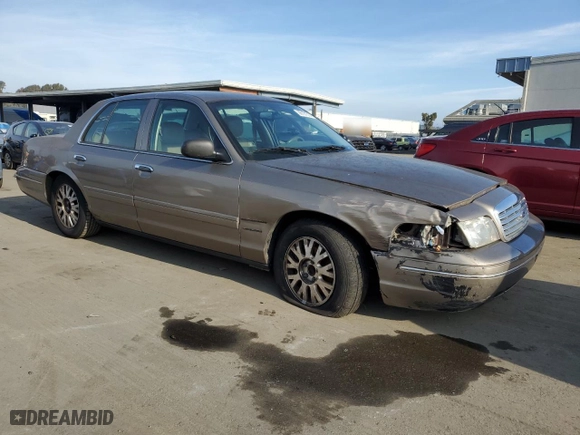 2004 Ford Crown Victoria LX with VIN 2FAFP74W24X132204, listed as a Copart auction lot 86191314 with 169,711 mi miles and Salvage Title. Bid and sale history available at carsss.com. Image 4.