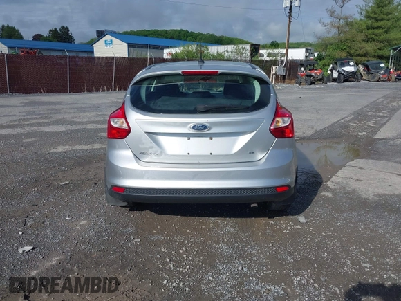 2012 Ford Focus SE z VIN 1FAHP3K27CL241013, wystawiony jako IAAI lot #42198812 z przebiegiem 121 888 mil mil oraz . Historia ofert i sprzedaży dostępna na DreamBid. Obrazek 17.