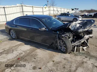 2018 BMW 7 Series 740i xDrive with VIN WBA7E4C53JGV24022, listed as a Copart auction lot 84907394 with 0 mi miles and Salvage Title. Bid and sale history available at carsss.com. Image 4.