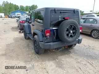 2013 Jeep Wrangler Sport with VIN 1C4AJWAG2DL505655, listed as a IAAI auction lot 42557213 with 185,502 mi miles and . Bid and sale history available at DreamBid. Image 3.