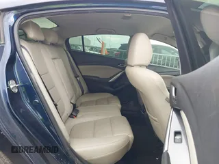 2017 Mazda Mazda6 Touring with VIN JM1GL1V54H1107722, listed as a IAAI auction lot 41521257 with 142,129 mi miles. Bid and sale history available at carsss.com. Image 8.