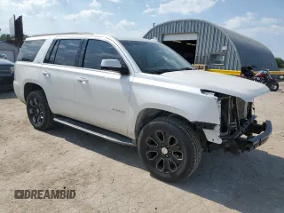 2016 GMC Yukon SLT with VIN 1GKS2BKC2GR253823, listed as a Copart auction lot 62029824 with 98,825 mi miles and Salvage Title. Bid and sale history available at carsss.com. Image 4.