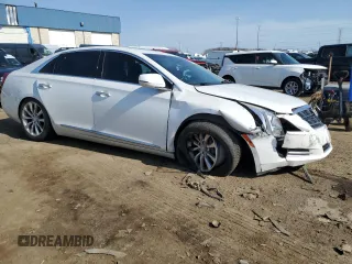 2016 Cadillac XTS Luxury Collection with VIN 2G61N5S31G9115560, listed as a Copart auction lot 49748285 with 130,458 mi miles and Clean title. Bid and sale history available at DreamBid. Image 4.