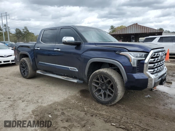 2023 Toyota Tundra 1794 Edition with VIN 5TFMA5AB7PX023918, listed as a Copart auction lot 49638235 with 58,499 mi miles and Salvage title. Bid and sale history available at DreamBid. Image 4.