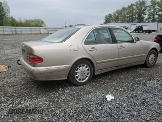 2001 Mercedes-Benz E-Class with VIN WDBJF65J51B378052, listed as a Copart auction lot 55057915 with 228,896 mi miles and Salvage Title. Bid and sale history available at carsss.com. Image 3.