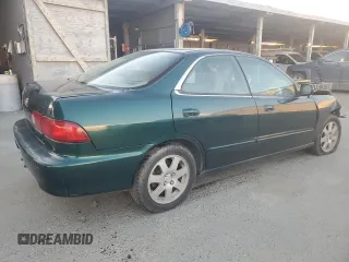 1999 Acura Integra with VIN JH4DB7665XS000928, listed as a Copart auction lot 80924344 with 198,981 mi miles and Salvage title. Bid and sale history available at DreamBid. Image 3.