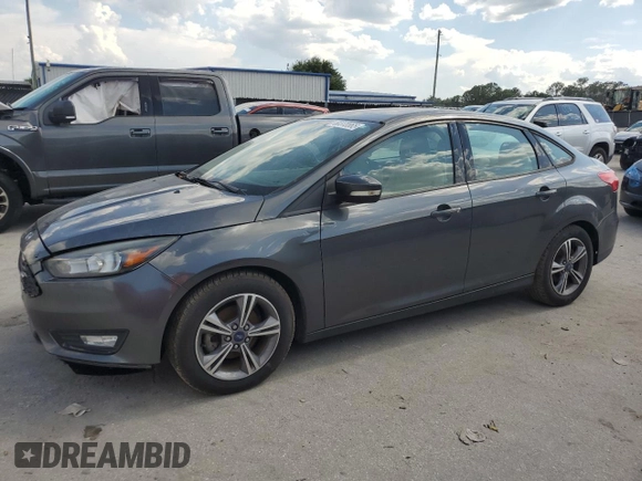 2017 Ford Focus SE with VIN 1FADP3FE2HL346276, listed as a Copart auction lot 60370865 with 120,403 mi miles and Clean title. Bid and sale history available at DreamBid. Image 2.